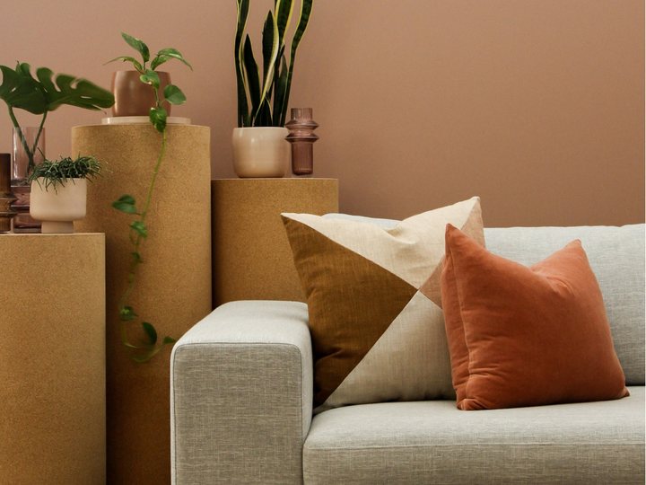 Warm living room with a sofa and cushions